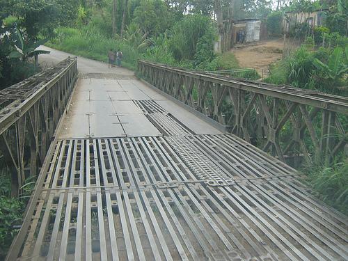 permanent bridge with decking needing repair